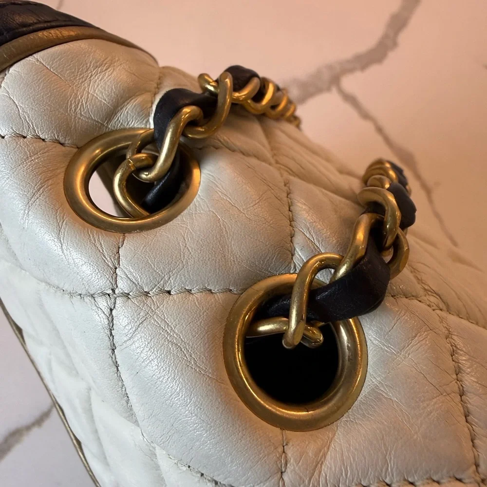 CHANEL Cream and Black Quilted Shoulder Bag with Gold Chain